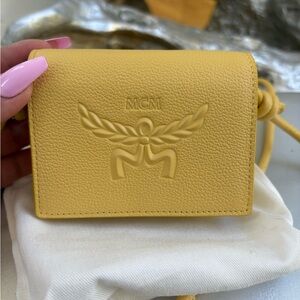 MCM Yellow Mini Bag with Textured Leather and Embossed Design